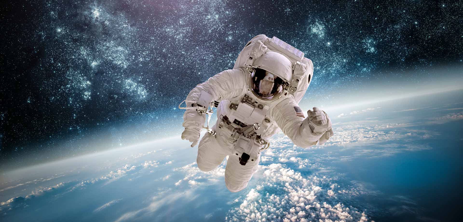 Astronaut floating above Earth